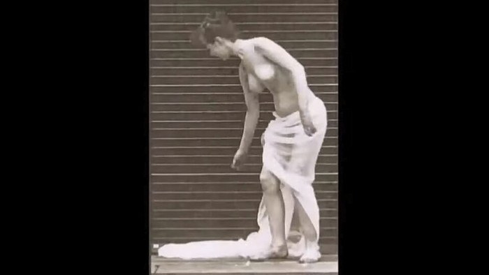 Woman Picking Up Skirt poster